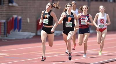 Players running track and field